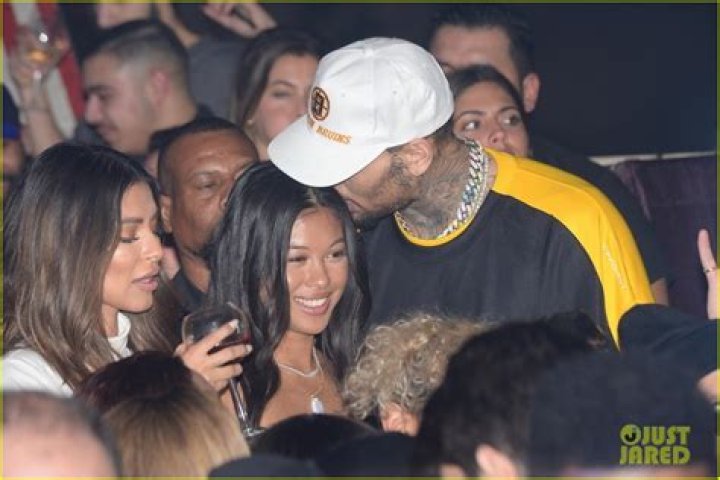 Chris Brown Packs on PDA with Rumored Girlfriend Ammika Harris Photo