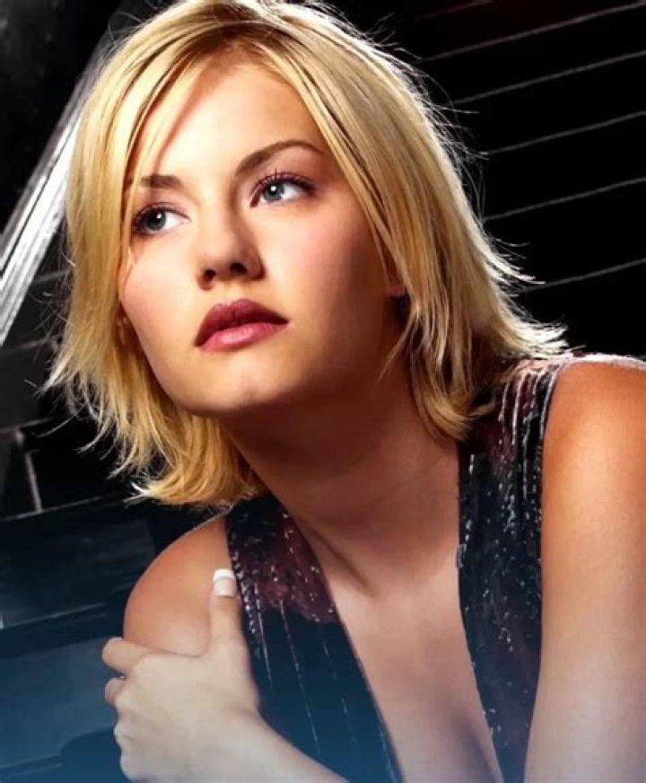Elisha Cuthbert Biography; Net Worth, Age, Height, Children, Movies
