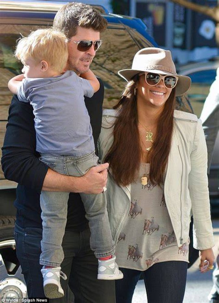 Robin Thicke plays happy families with wife Paula Patton and son Julian