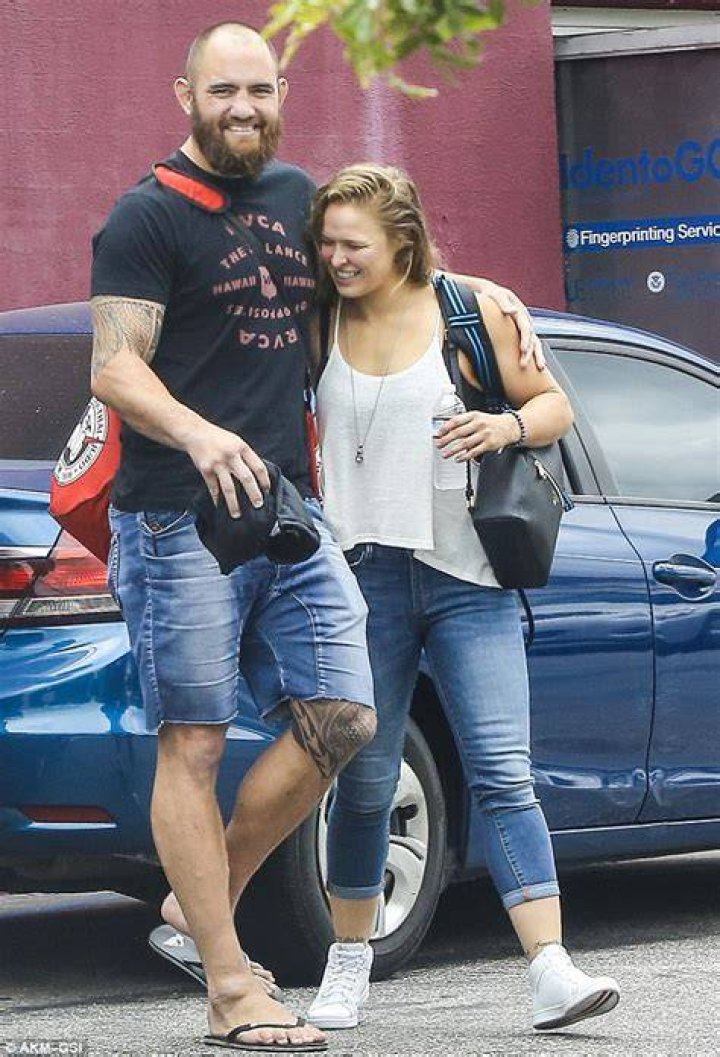 Ronda Rousey beams while enjoying romantic stroll with boyfriend Travis