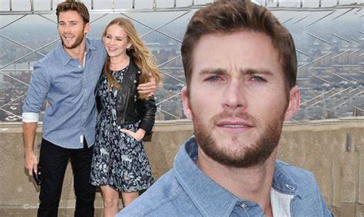 Scott Eastwood cuddles up to Britt Robertson as they promote The