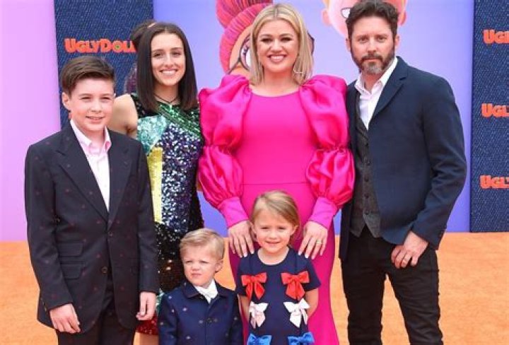 Why did Kelly Clarkson divorce Brandon Blackstock? m One